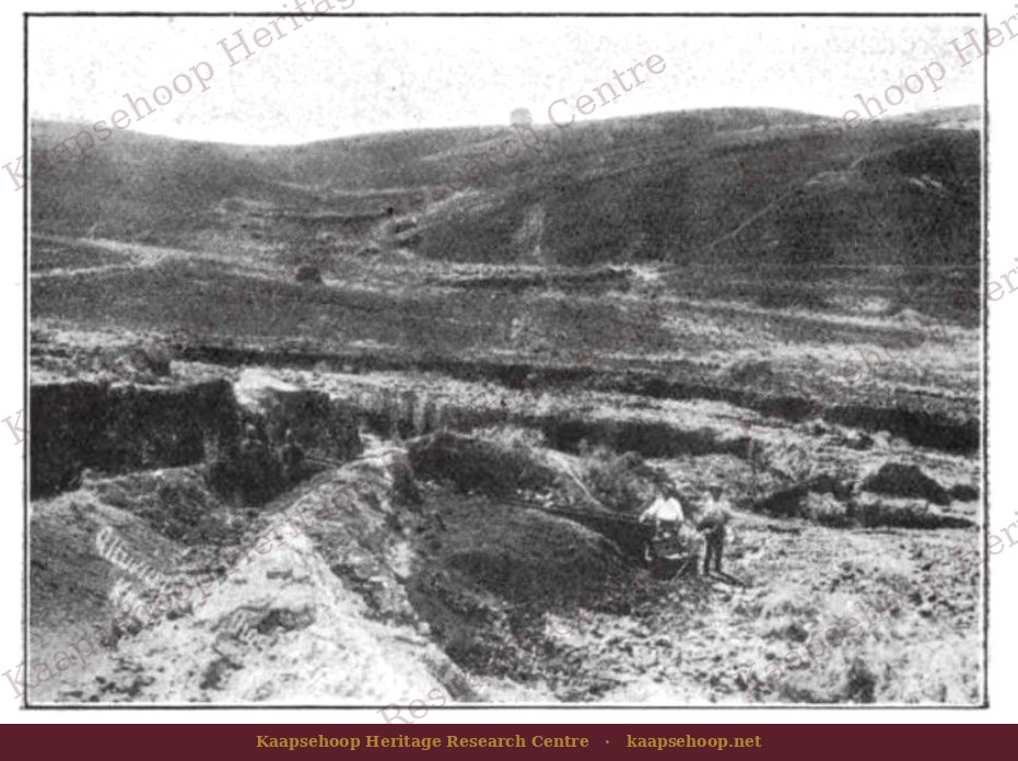 Alluvial gold diggings at Kaapsche Hoop, two diggers working the creek gravels